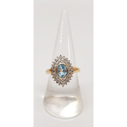 10 - A hallmarked 9ct gold blue topaz and diamond cluster ring totalling .25ct of diamond, gross weight 4... 