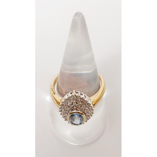 10 - A hallmarked 9ct gold blue topaz and diamond cluster ring totalling .25ct of diamond, gross weight 4... 