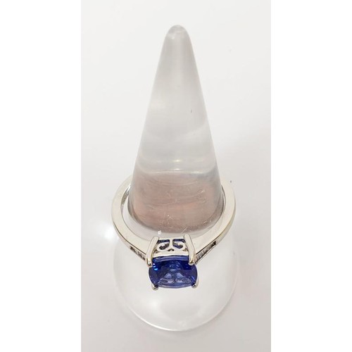 21 - A platinum tanzanite and diamond ring, gross weight 6g, size Q/R. UK shipping £14.