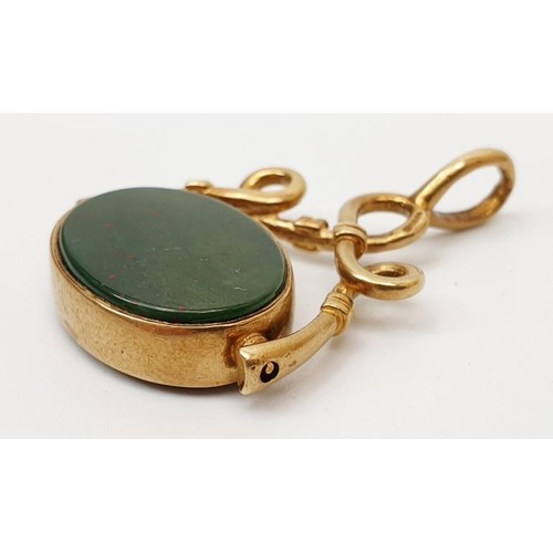 32 - A hallmarked 9ct gold and hard stone swivel fob, length 4cm, gross weight 7.7g. UK shipping £14.