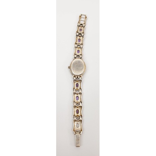 35 - Two 925 silver quartz cocktail watches set with marcasite and purple stones, A/F, together with a 92... 