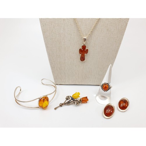 36 - A selection of 925 silver and amber jewellery. UK shipping £14.