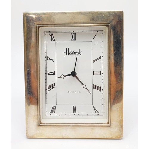 48 - A Harrod's hallmarked silver and wooden quartz clock, height 16.5cm, Sheffield 1996. UK shipping £14... 