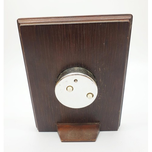 48 - A Harrod's hallmarked silver and wooden quartz clock, height 16.5cm, Sheffield 1996. UK shipping £14... 