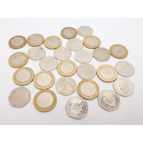 54 - Thirteen collectable £2 coins and fourteen collectable 50p coins. UK shipping £14.