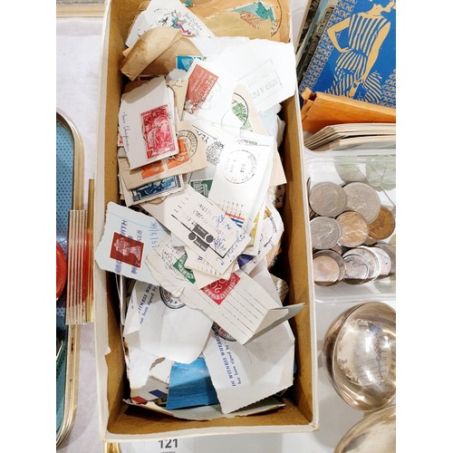 121 - A tray of assorted including vintage suitcase labels, coins including five silver content, postcards... 