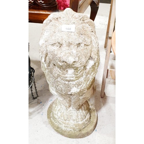 168 - A concrete garden ornament in the form of a lion, height 57cm. No shipping. Arrange collection or yo... 