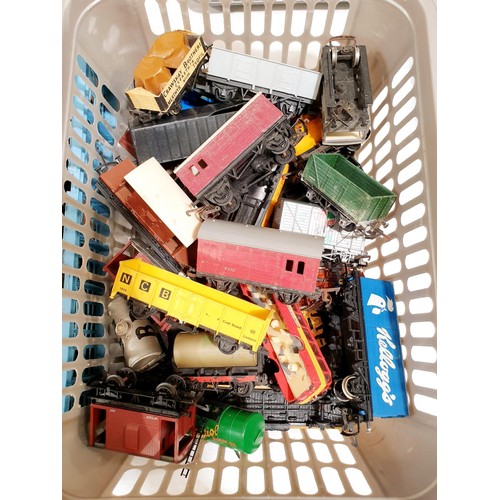 226 - Three boxes of 00 gauge rolling stock and locomotive parts. UK shipping £14.