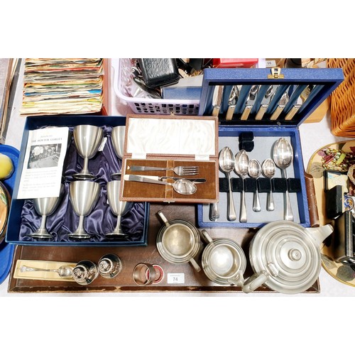 74 - A three piece pewter tea set, cased flatware and other flatware. UK shipping £14.