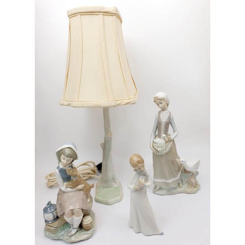 120 - A Lladro figure of a girl with geese, height 31.5cm, a Lladro figure of a girl with a dog and a Nao ... 