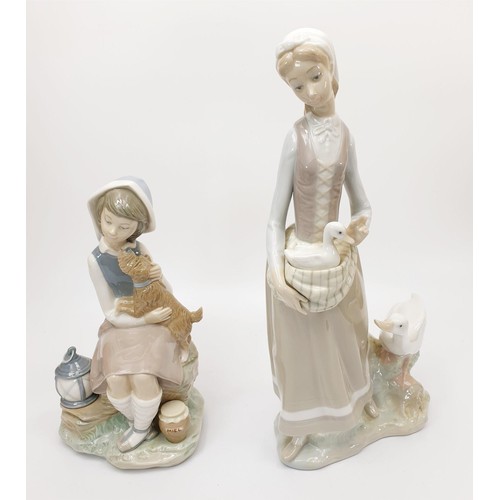 120 - A Lladro figure of a girl with geese, height 31.5cm, a Lladro figure of a girl with a dog and a Nao ... 