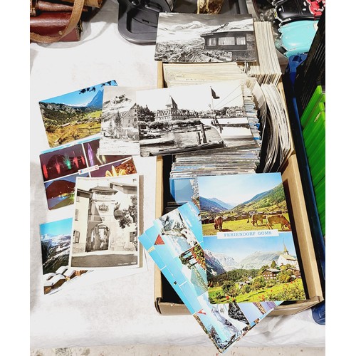 234 - A box of postcards mainly of Switzerland. UK shipping £14.