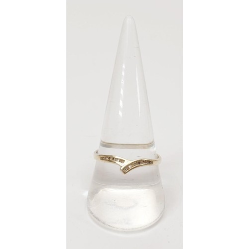 12 - A hallmarked 9ct white gold and diamond ring, gross weight 1.3g, size T. UK shipping £14.