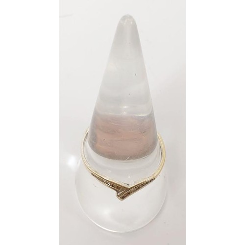 12 - A hallmarked 9ct white gold and diamond ring, gross weight 1.3g, size T. UK shipping £14.