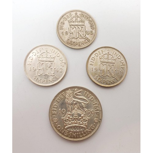 2 - Uncirculated George VI Sixpences: 1939, 42 and 46 together with a one shilling 1939. UK shipping £14... 