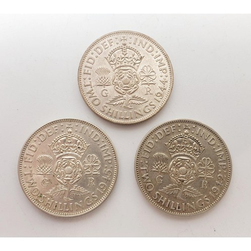 3 - Uncirculated George VI two shilling coins: 1942, 44 and 45. UK shipping £14.