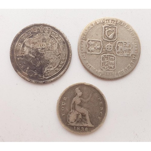 20 - Three silver content Georgian coins: a sixpence 1757, a sixpence 1816 and a four pence 1836. UK ship... 