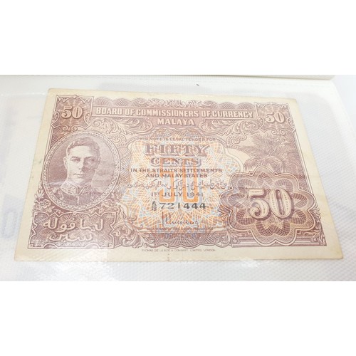 21 - Selection of bank notes including WWII Malaya cent notes. UK shipping £14.