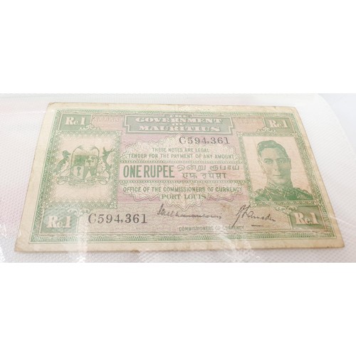 21 - Selection of bank notes including WWII Malaya cent notes. UK shipping £14.