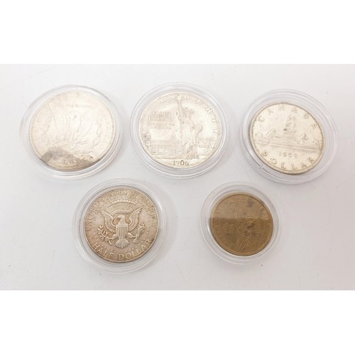 27 - Selection of United States of America and Canadian silver content coins and one other American coin.... 