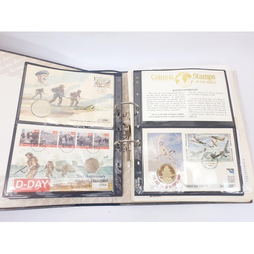 40 - A folder of military first day covers including some with coins. UK shipping £14.