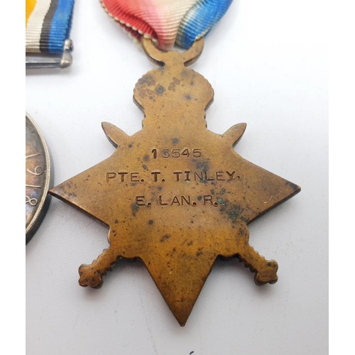 124 - WWI Victory, 1914-18 War and 1914-15 Star medals relating to 18545 Pte. T. Tinley. E. LAN. R. with A... 