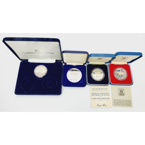 43 - Four silver proof Royal commemorative coins including a 1976 United States Bicentennial visit coin. ... 