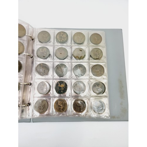 42 - A folder of British coinage including uncirculated. UK shipping £14.