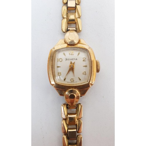 4 - A ladies Helvetia cocktail watch in a hallmarked 9ct gold case on a gold plated strap. UK shipping £... 