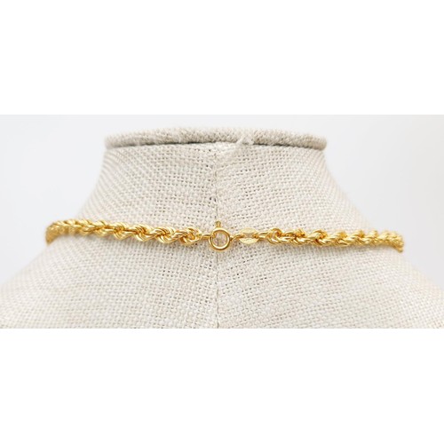 15 - An 18ct gold rope twist necklace, length 70cm, weight 18g. UK shipping £14.