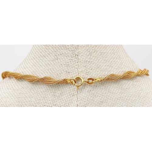 17 - An 18ct gold twist necklace, length 41cm, weight 15.2g. UK shipping £14.