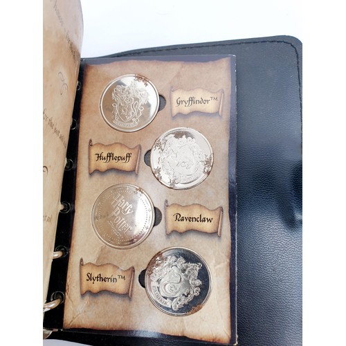 42 - A Harry Potter and The Philosopher's Stone Gringotts coin collection savings book with coins. UK shi... 