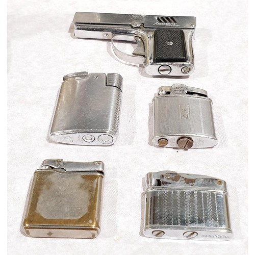 54 - Four pocket lighters including Ronson and an Awrora 45 pistol lighter. UK shipping £14.