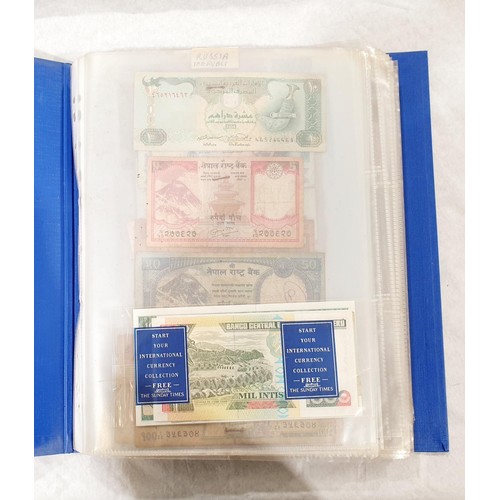 60 - A folder of world bank notes. UK shipping £14.