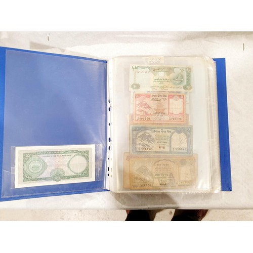 60 - A folder of world bank notes. UK shipping £14.