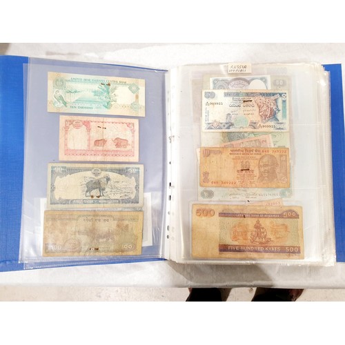 60 - A folder of world bank notes. UK shipping £14.