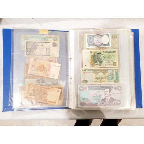 60 - A folder of world bank notes. UK shipping £14.