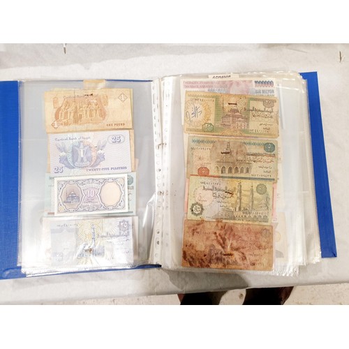 60 - A folder of world bank notes. UK shipping £14.