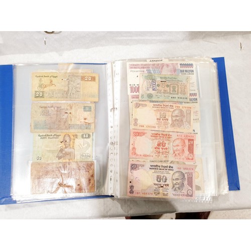 60 - A folder of world bank notes. UK shipping £14.