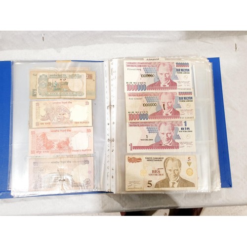 60 - A folder of world bank notes. UK shipping £14.