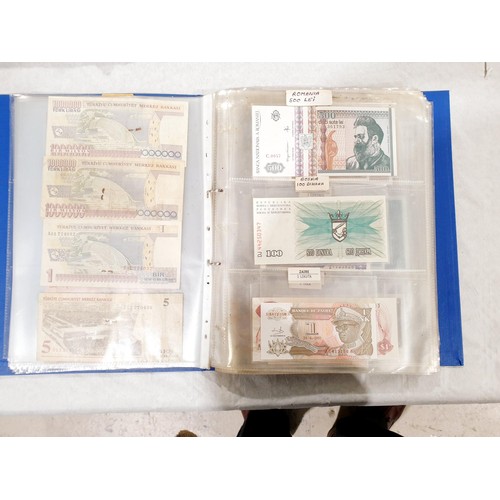 60 - A folder of world bank notes. UK shipping £14.