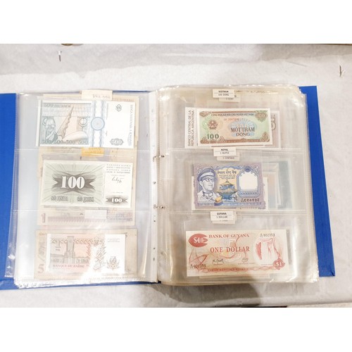 60 - A folder of world bank notes. UK shipping £14.