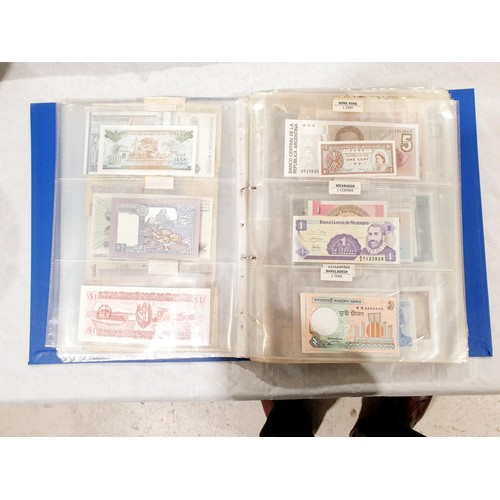 60 - A folder of world bank notes. UK shipping £14.