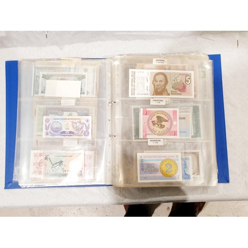 60 - A folder of world bank notes. UK shipping £14.