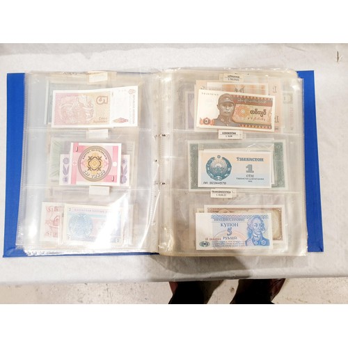 60 - A folder of world bank notes. UK shipping £14.