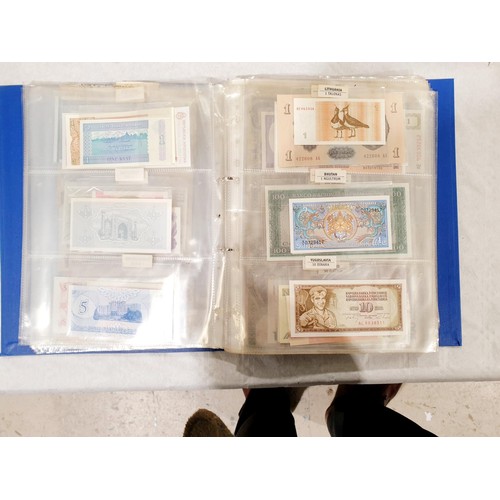 60 - A folder of world bank notes. UK shipping £14.