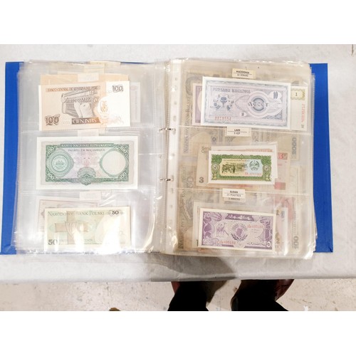 60 - A folder of world bank notes. UK shipping £14.