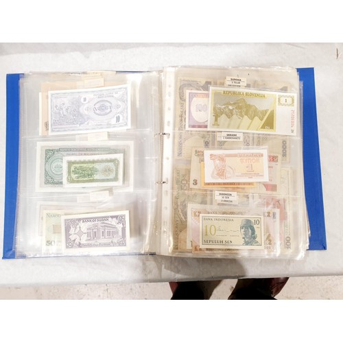 60 - A folder of world bank notes. UK shipping £14.