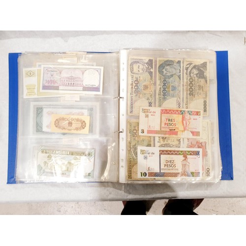 60 - A folder of world bank notes. UK shipping £14.