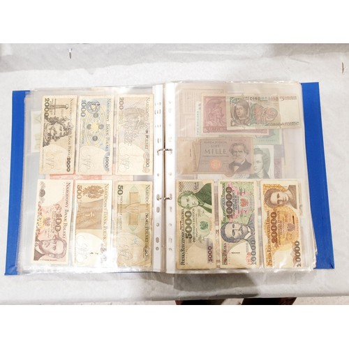 60 - A folder of world bank notes. UK shipping £14.